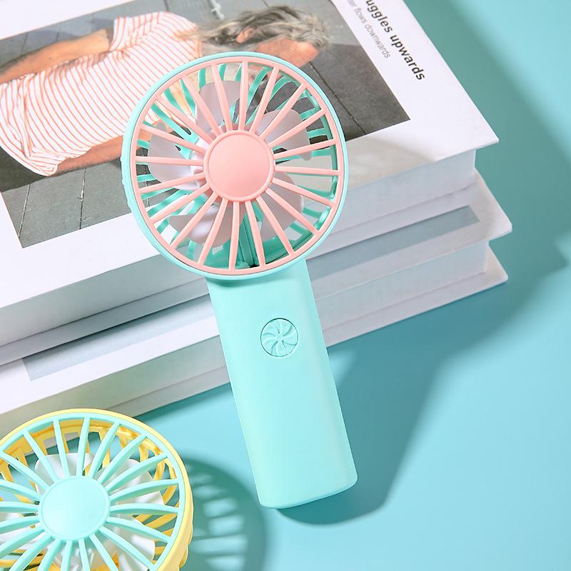 Tragbarer Taschenventilator für Studenten: Süß, Zweifarbig, Handheld, Wiederaufladbar, Vertikale Lagerung.