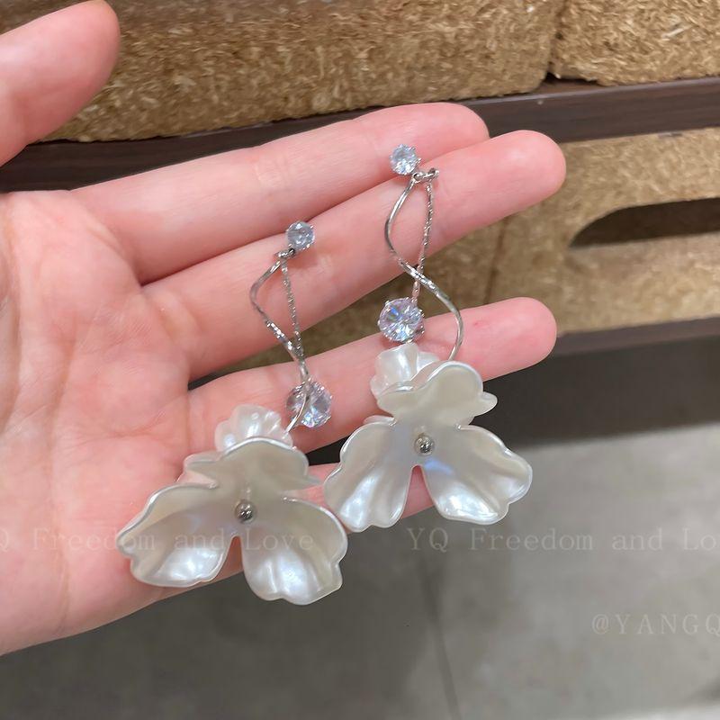 

French Flower Long Tassel Earrings Ear Clip Female Seaside Vacation Style Fancy Elegant Stud Earrings Non-Piercing Earrings Flower Long Stud Earrings