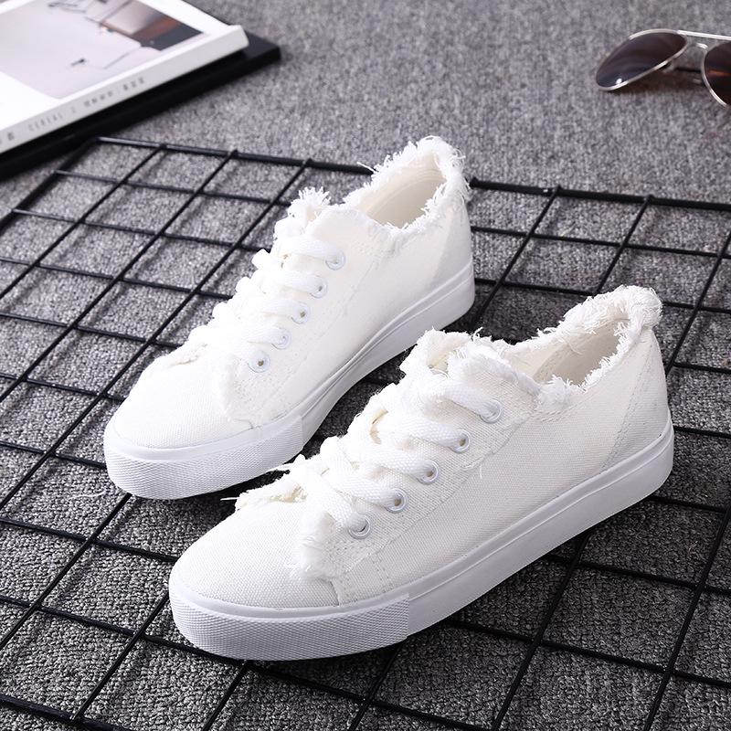 flat white canvas shoes
