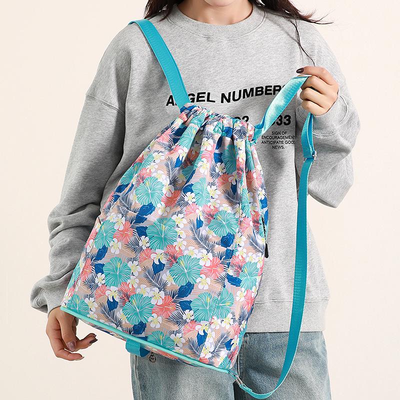Lightweight Waterproof Women's Drawstring Backpack: Foldable Storage & Sports Travel Bag