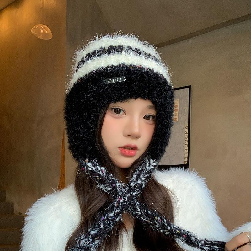 

Pastoral knitted wool hat children s winter thickened warm ear protection headgear shows a small and versatile face