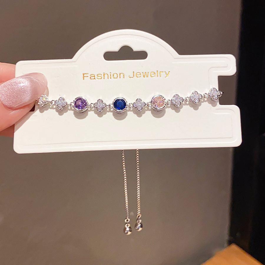 Vintage Style Zircon Flower Charm Hand Chain With Silver Finish For Ladies