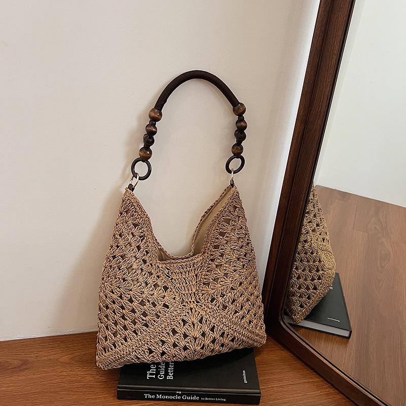 

Summer fashion bag women 2025 new seaside beach hollow shoulder bag French portable woven tote bag хаки
