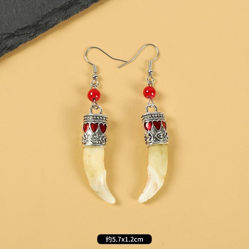 Tibetan wolf tooth earrings Tibetan silver inlaid real Tibetan mastiff dog tooth personality temperament niche earrings Tibetan earrings