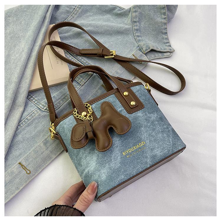 Nischen-Retro-Tasche Damen neue Frühling und Sommer vielseitige Umhängetasche exquisite tragbare Bucket Bag