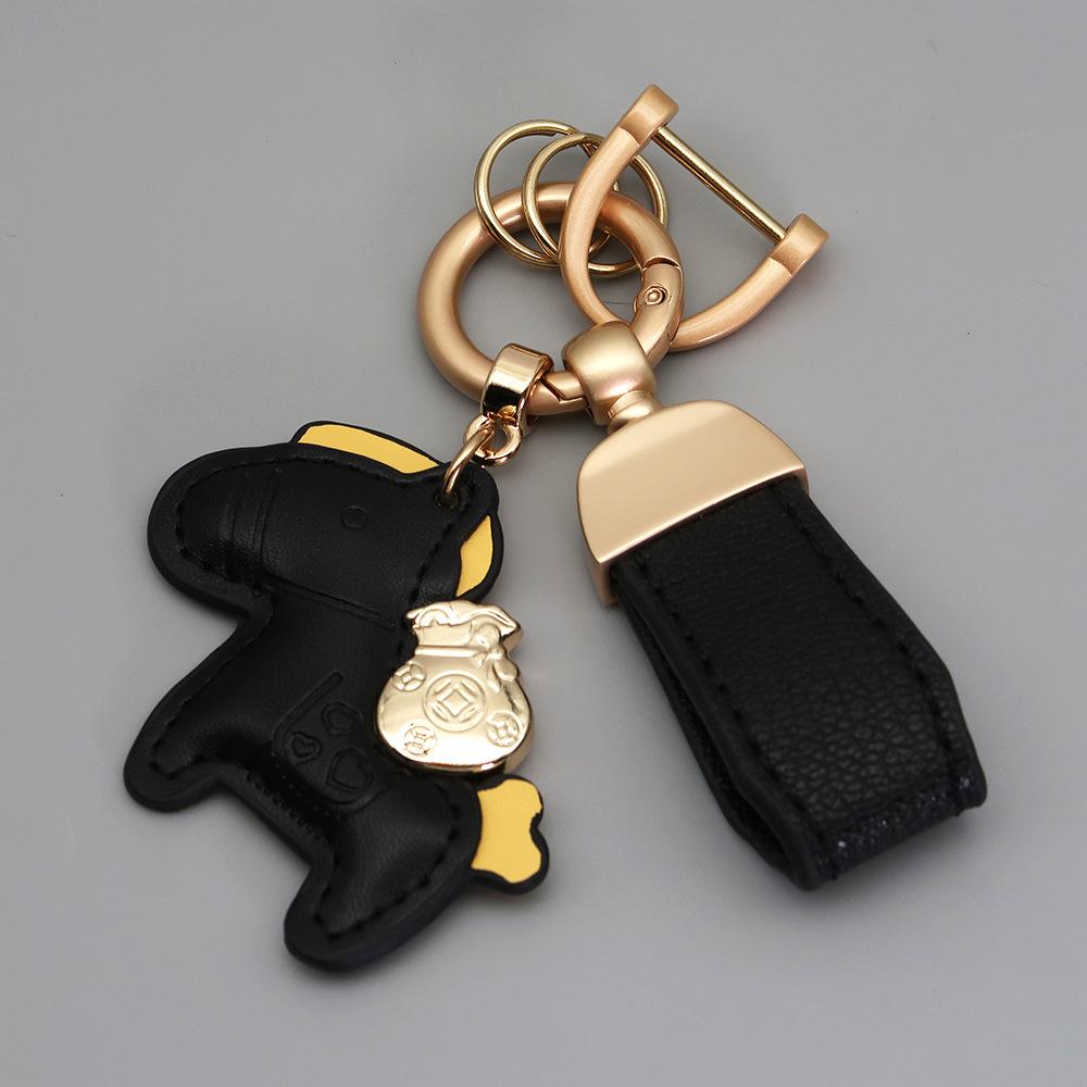 Kleiner Schaf- & Pferdeleder-Schlüsselanhänger mit Perlenanhänger - Gold