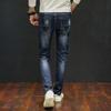 Korejská verze elastických slim fit džínů s malou dírkou pro pánské čtyřsezónní džíny s malými nohama