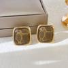 Silver Needle Clover Stud Earrings: Retro Hong Kong Style, Elegant and Fashionable Women's Luxury Jewelry.