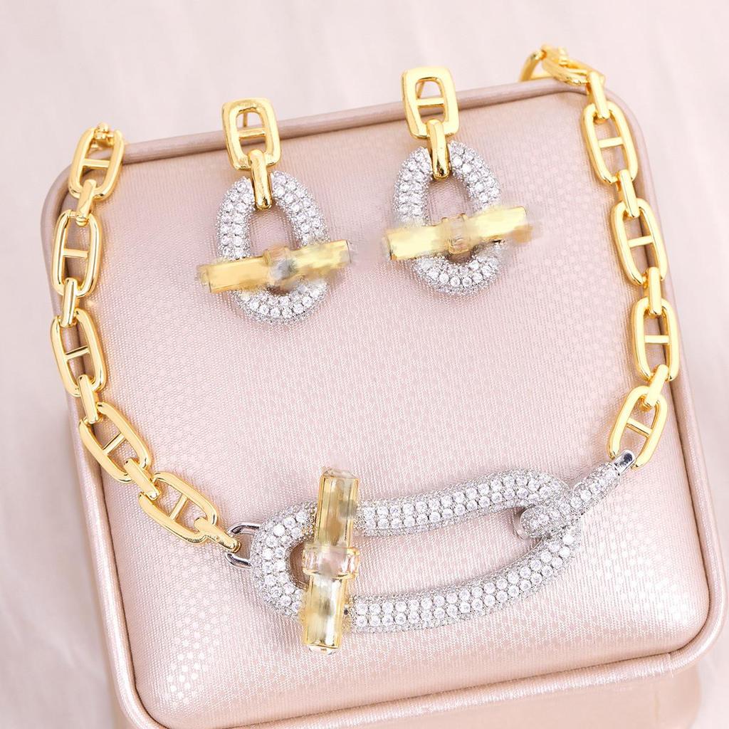 Trendy Hip-Hop Jewelry Set: Copper Zircon Pig Nose Necklace, Earrings, Ring, and Bracelet
