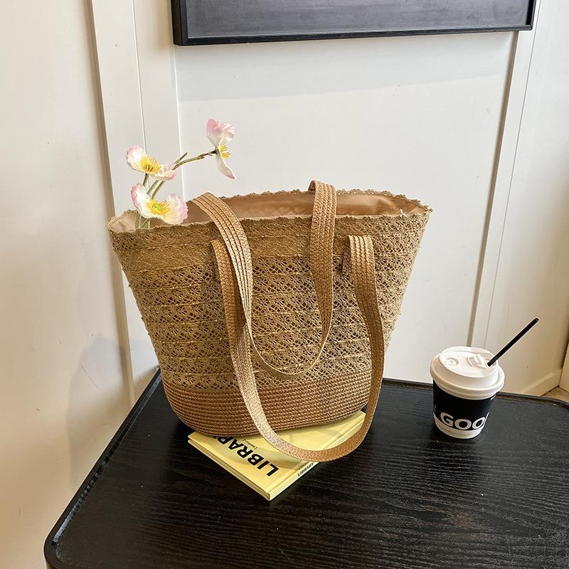 

Holiday wind woven bag women s new summer small fresh large capacity straw bag commuter bucket bag хакі