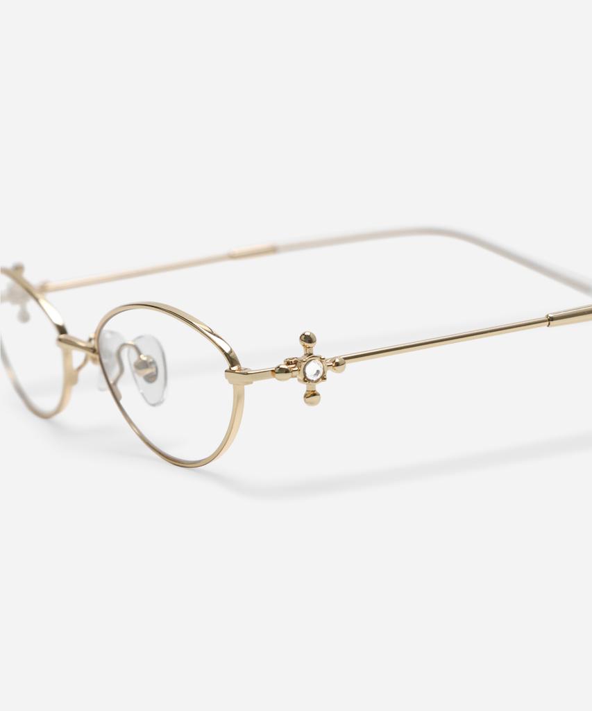 Neotelia Qnoti · Gold