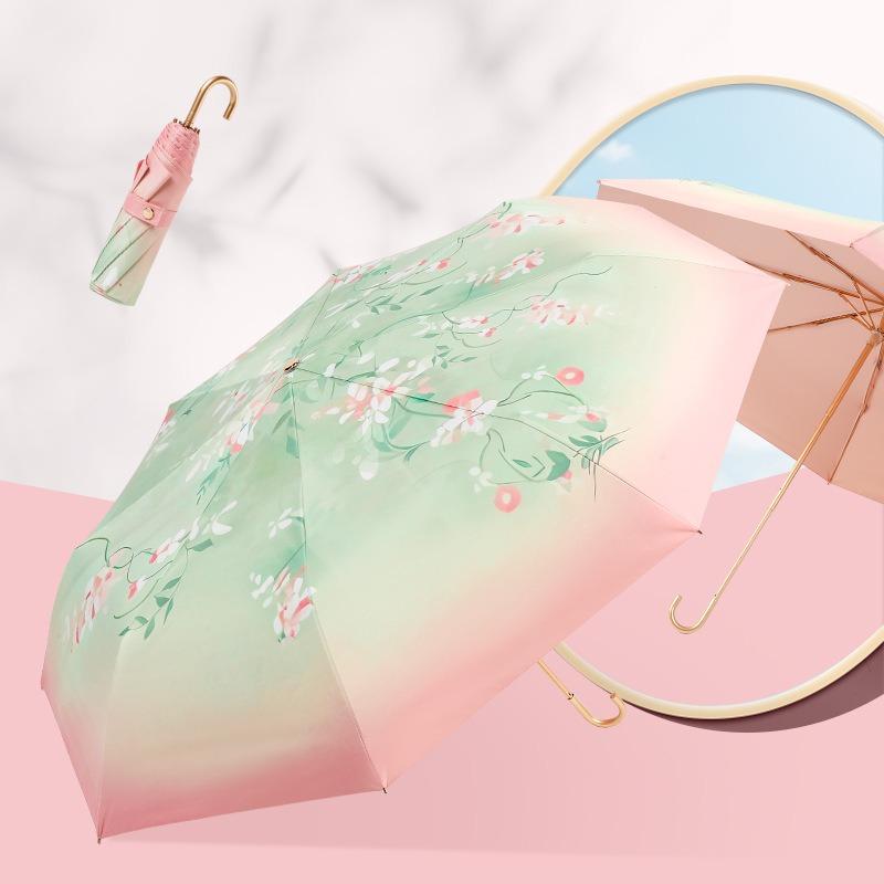 New three-fold small gold hook gold skeleton colored glue fabric gift bag umbrella weather and rain folding umbrella