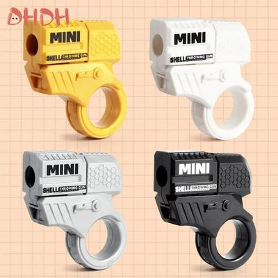 Nuova Pistola Giocattolo Decompressione Lancio Bossoli Pistola a Proiettili Giroscopio da Dita Può Sparare Proiettili Morbidi Plastica Pistola da Dito Catena Decorativa