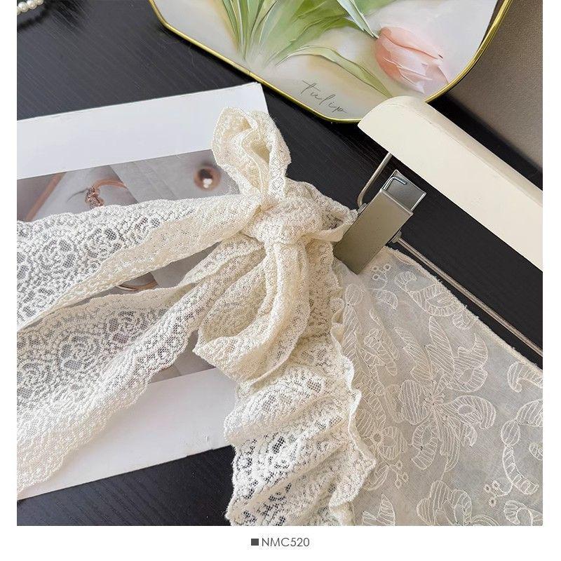 Spring 2025 Women's Irregular Lace Midi Skirt with Bow and Ruffle Fishtail Design