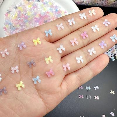 50 ks Průhledná mašle na nehty, díly, přívěsky, objemové lesklé mini pryskyřičné stuhy, kamínky na nehty, DIY letní dekorace na nehty, doplňky