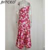 BITCED Women's Commuter Dress: Minimalist, Elegant, and Stylish with a Slanted Neckline, Straps, and a Fishtail Print