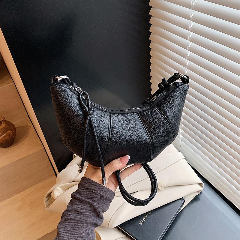 

Spring new niche trend simple horn bag commuter fashion single shoulder dumpling women s messenger bag чорний