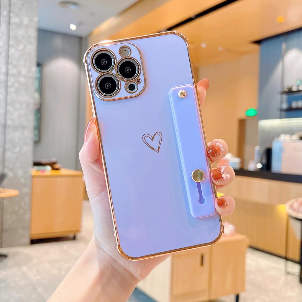 Applicable to iphone17pro mobile phone case Apple hollow love + bracket wristband new 15 Apple 16promax