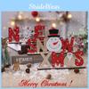 Whimsical Holiday Tabletop Decorations Featuring Cartoon Style Christmas Accents