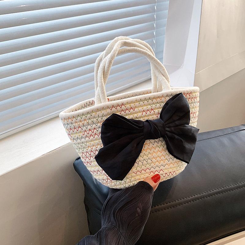 

Straw bag women s 2024 new ins casual retro pastoral rattan bucket bag beach woven handbag бежевий