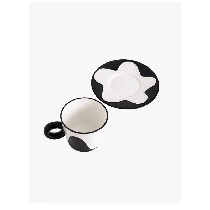 Beautiful black and white wavy coffee cup