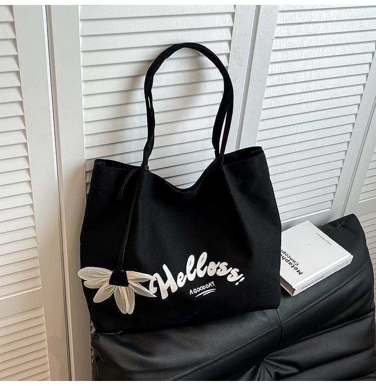 

Portable canvas bag women s 2025 summer new large-capacity tote bag niche design daily commuter shoulder bag чёрный