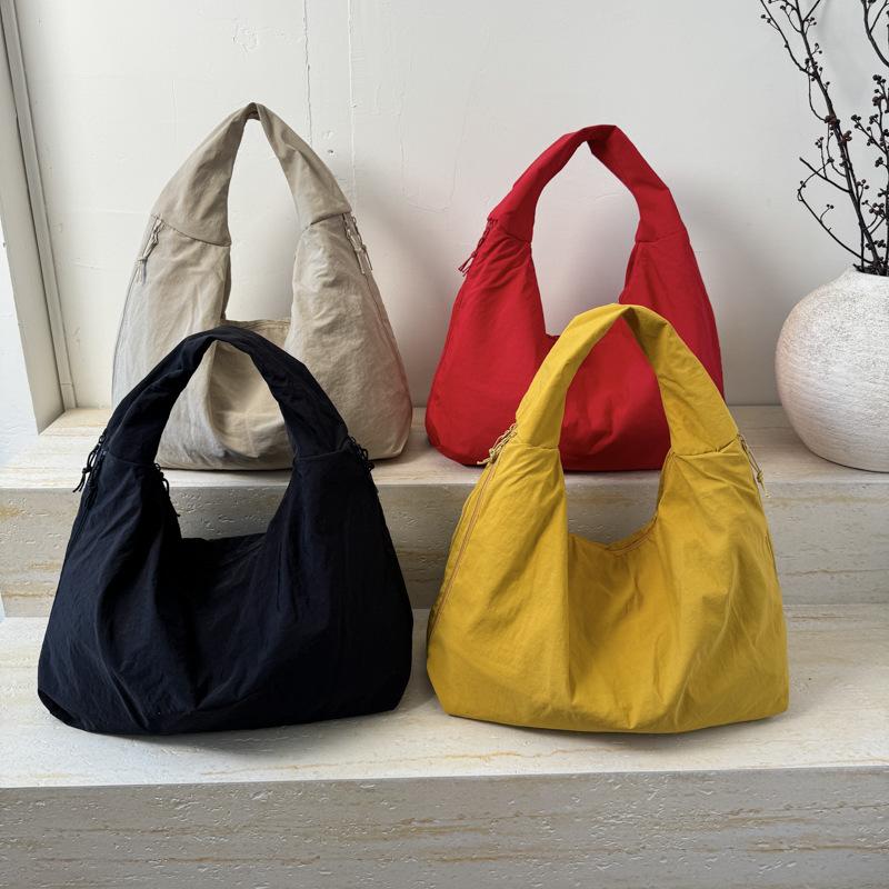 Autumn and winter versatile commuter shoulder bag women's large-capacity lazy style casual canvas tote bag new armpit bag