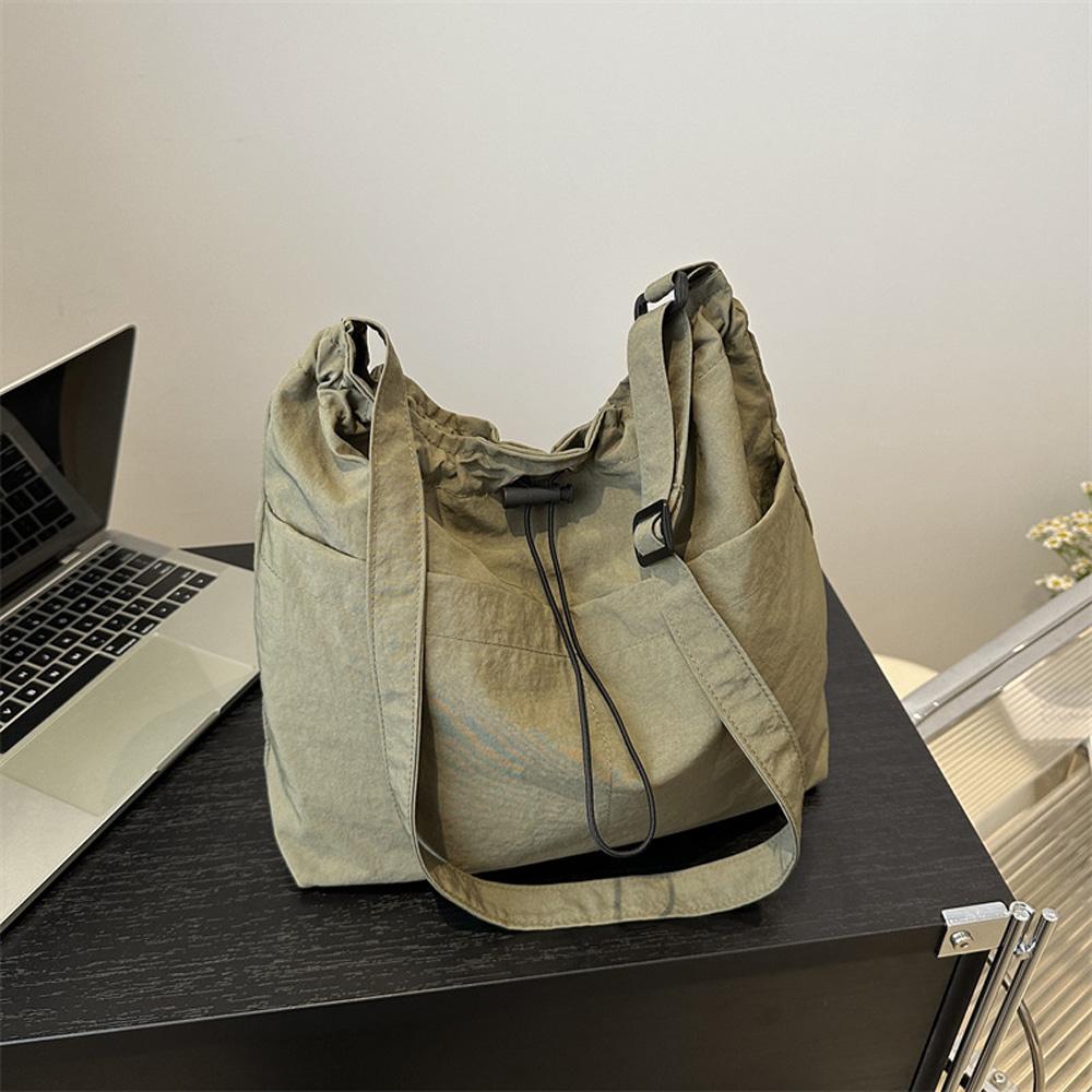 Large-capacity waterproof nylon fabric drawstring pleated single-shoulder bag, travel and leisure crossbody bucket bag A-DH