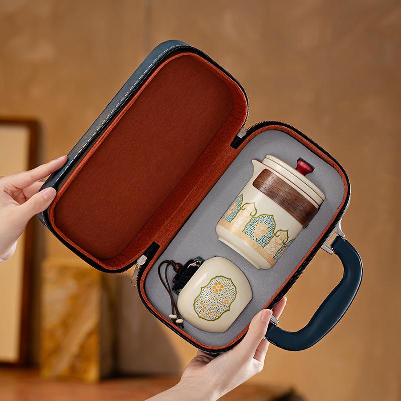 Dehua ceramic travel tea set Ru kiln retro outdoor ancient rhyme hand-held pot camping portable tea fast customer set