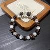 New Chinese-style genuine coffee bean cat's eye stone bracelet for men and women, vintage irregular beaded elastic bracelet for couples