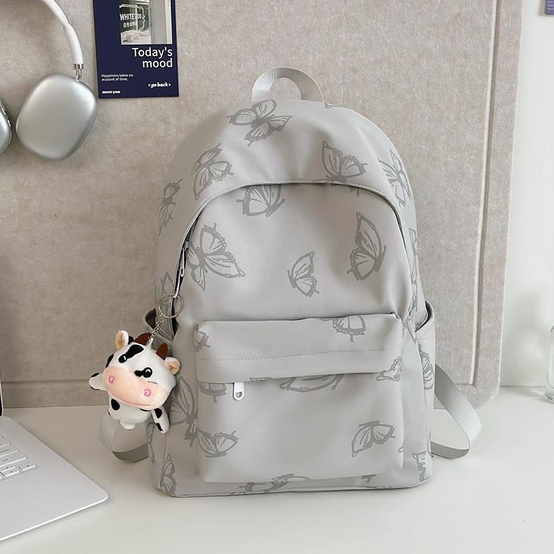 High-value reflective butterfly backpack, new junior high school girl high school student schoolbag ins niche travel backpack