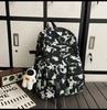 School bag large capacity multi-compartment tide cool junior high school students design sense versatile personality graffiti back