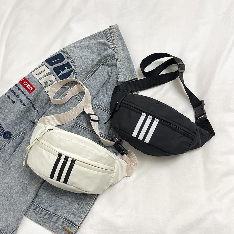 Breast bag, men's and women's multi-functional fanny pack, new solid color tooling style canvas bag, shoulder messenger bag.