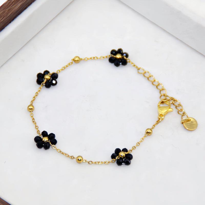 

Elegant 18K Gold Beaded Necklace & Flower Bracelet in Titanium Steel