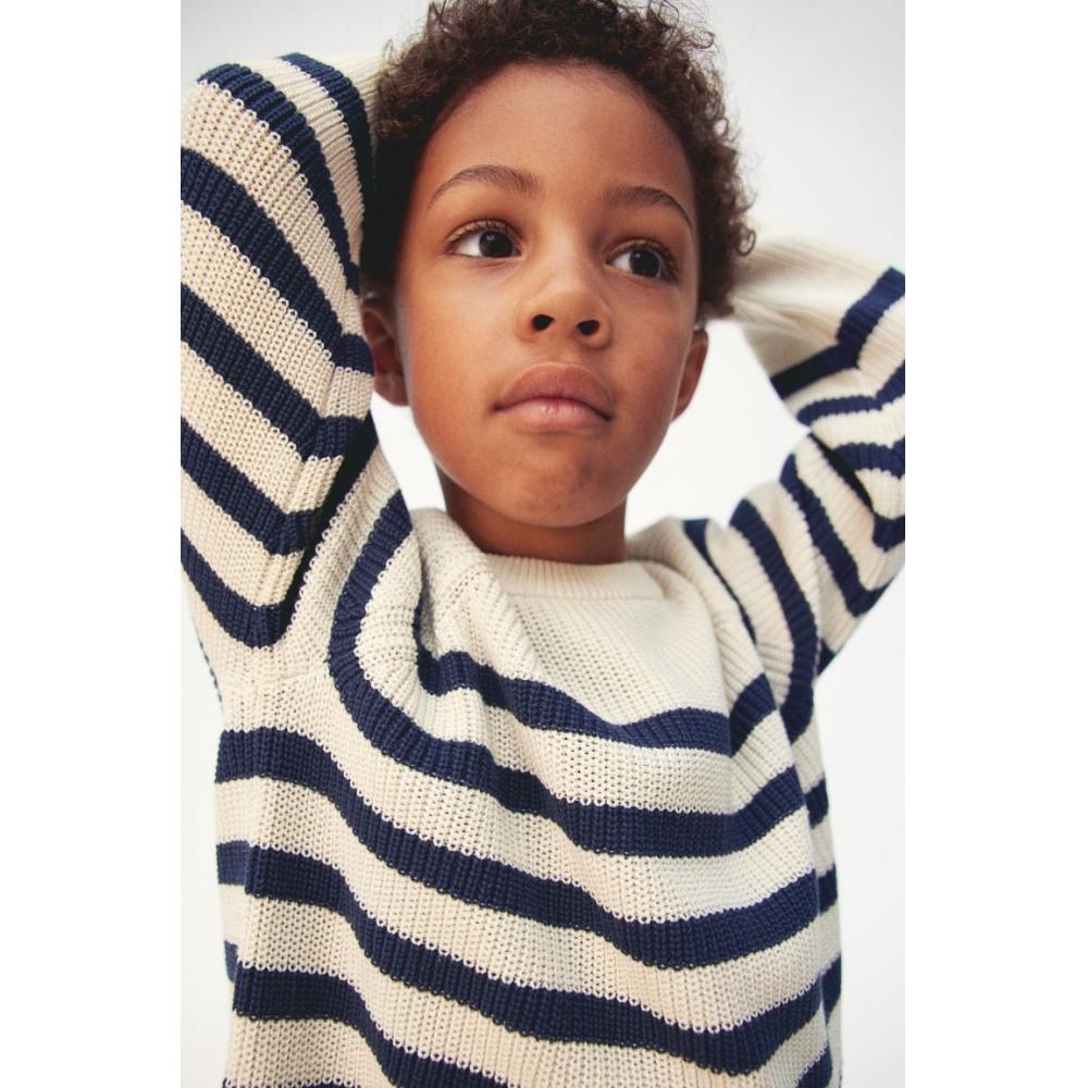 

Хлопковый трикотажный свитер HM кремового цвета, темно-синего цвета