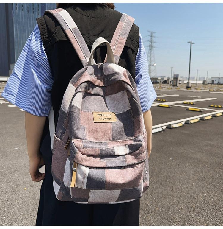 Large-capacity new middle school schoolbag, junior high school backpack, boys' casual versatile college student computer bag, women