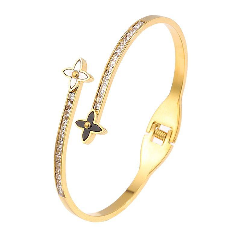 Four-leaf Clover Titanium Steel  Female High-end Sense Does Not Fade Oval Elastic Opening  Personalized Versatile Diamond-encrusted 