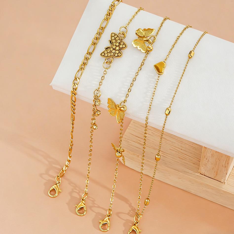 4-piece Gold Butterfly Multi-layer Anklet Set, Creative Beaded Heart Chain Anklet, Suitable for Vacation and Beach Wear.