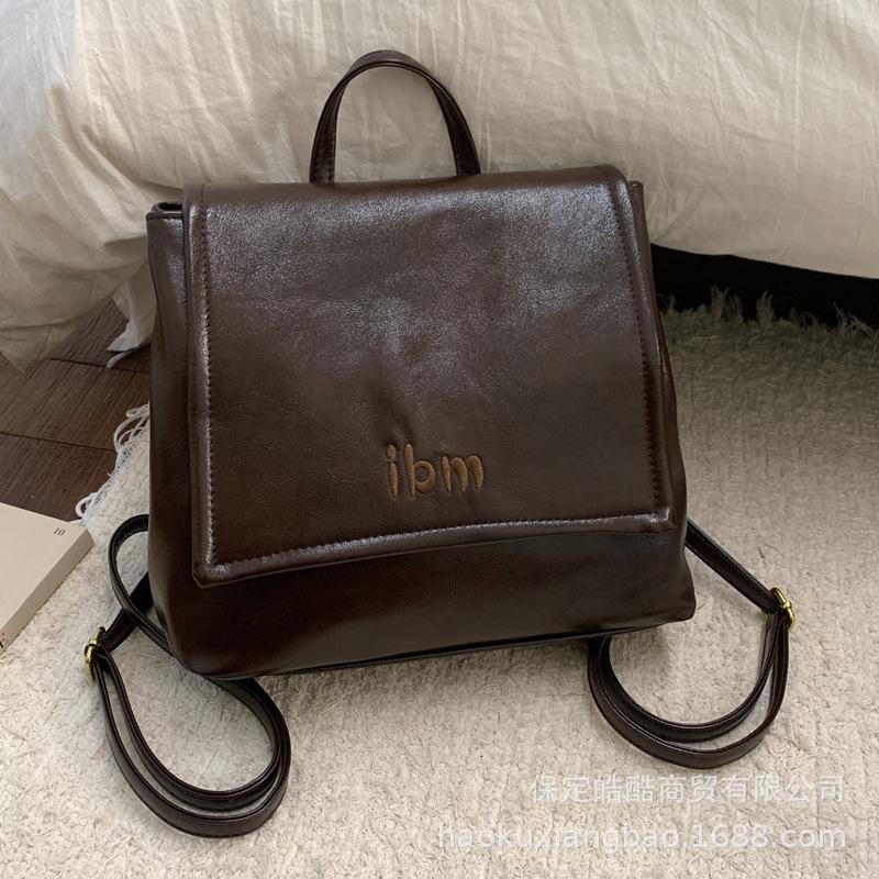 Oily leather retro women's backpack 2025 new fashion commuting versatile backpack exquisite small schoolbag travel bag