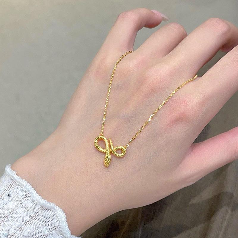 Gold Wrapped Spirit Snake Necklace: Luxury Clavicle Sweater Chain, Elegant High-Grade Design for Women