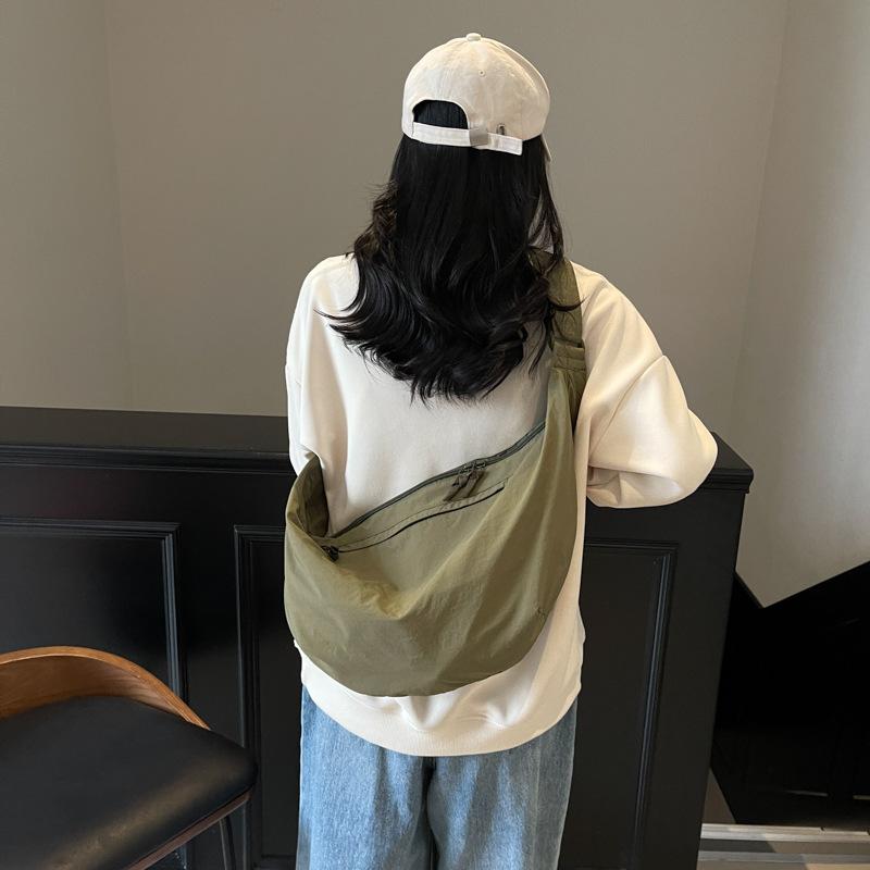 2025 women's bag Korean version ins canvas dumpling bag fashion casual messenger bag simple breast bag trendy bag