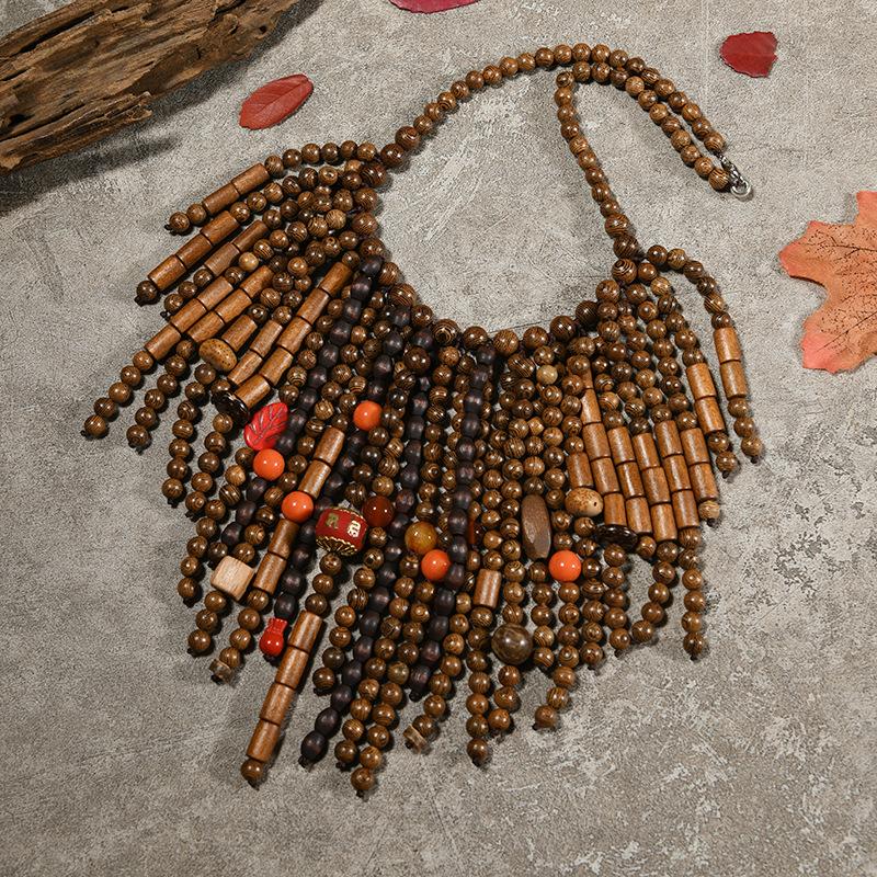 Schwere handgefertigte Holzperlenkette Vintage Bohemian Nische Übertriebene Persönlichkeit Quaste Pulloverkette Damen