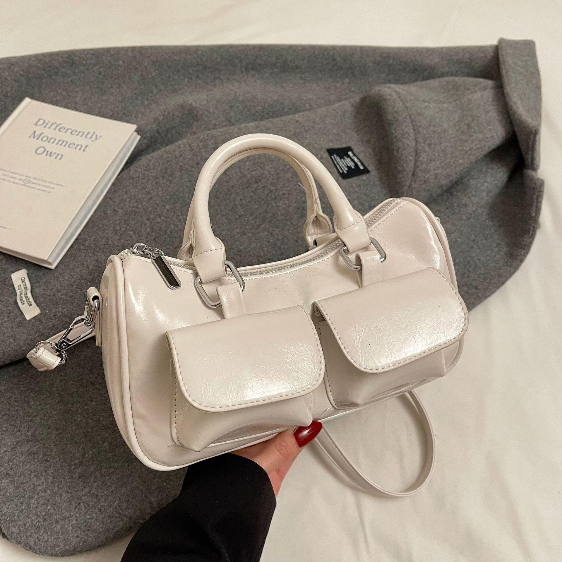 

Простая повседневная портативная маленькая квадратная сумка 2025 новая корейская версия высококлассная модная сумка через плечо нишевый дизайн сумка-мессенджер белый