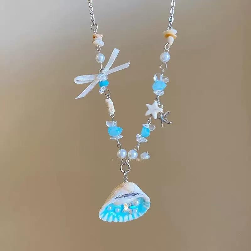 Hot-selling Rice Bead Resin Starfish Pendant Necklace Simple and Sweet Versatile Collarbone Chain Design Sense Niche Item Decoration