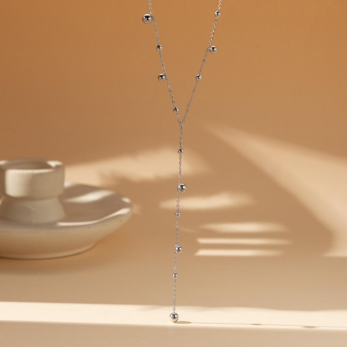 

2024 Современное ожерелье из нержавеющей стали с 18-каратным золотым покрытием и кисточкой из бусин для ношения каждый день серебряный