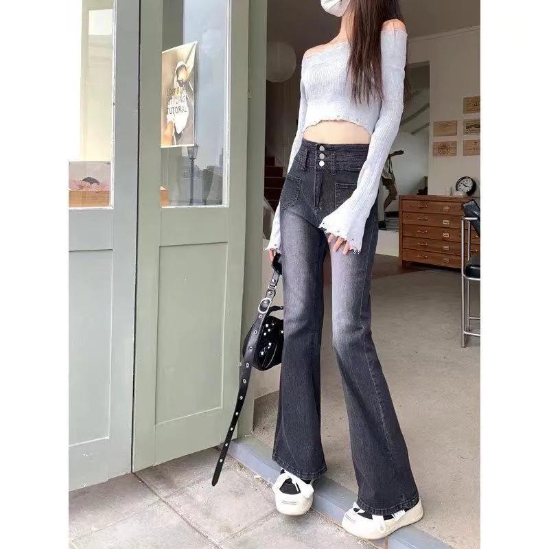 Dżinsy rozszerzane z wysokim stanem w kolorze szarym dymnym, zapinane na trzy rzędy guzików, wyszczuplający krój, styl retro, długość do podłogi, idealne na wiosnę i lato