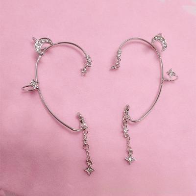 Orecchini a clip a forma di stella e luna con diamanti: Elegante design con nappe per donna