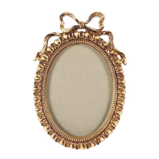 

Овальная фоторамка в европейском стиле из смолы с тисненым бантом