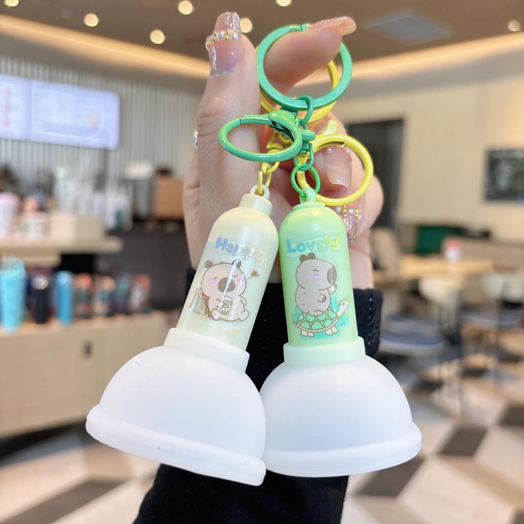 Luminous Keychain Toilet Plunger: Cute Night Light & Decompression Toy for Students