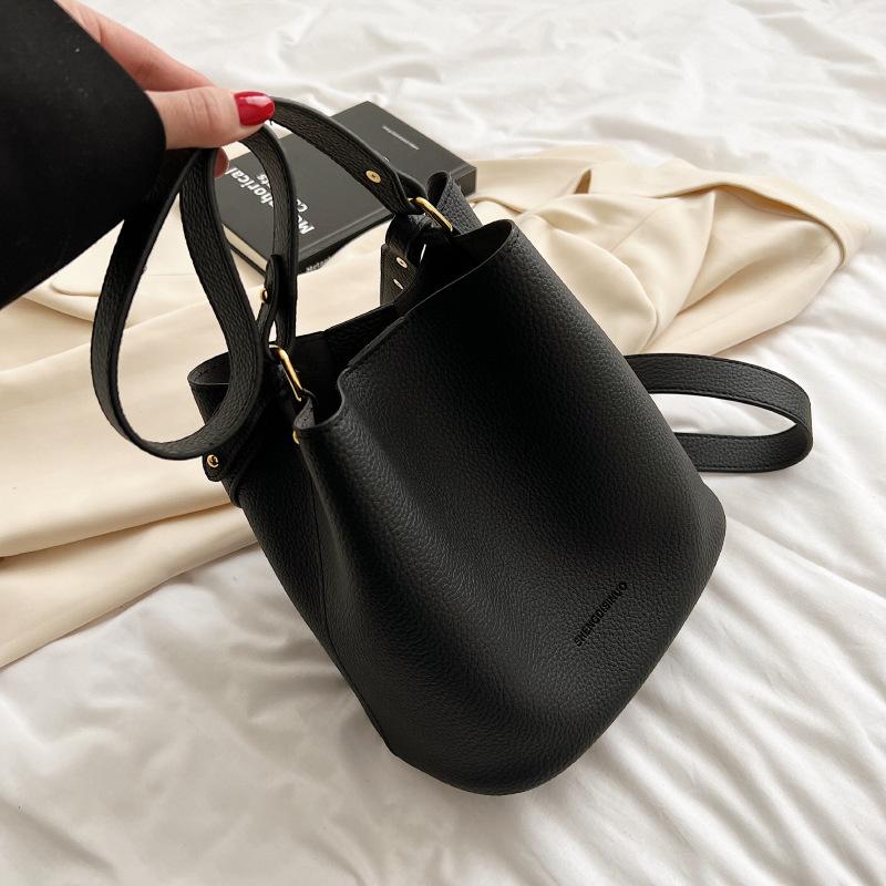 Premium Sense Kind- und Muttertasche Bucket Bag Neue Nischenmode Schulter-Umhängetasche Große Kapazität Vielseitige Achseltasche
